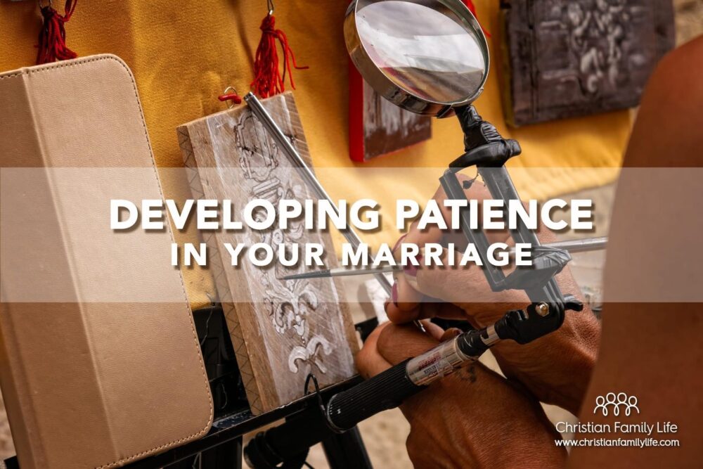 A person etching art work with a magnifying glass and practicing patience.